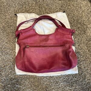 Foley and Corinna. Fuschia. Used condition. Leather can be conditioned/cleaned